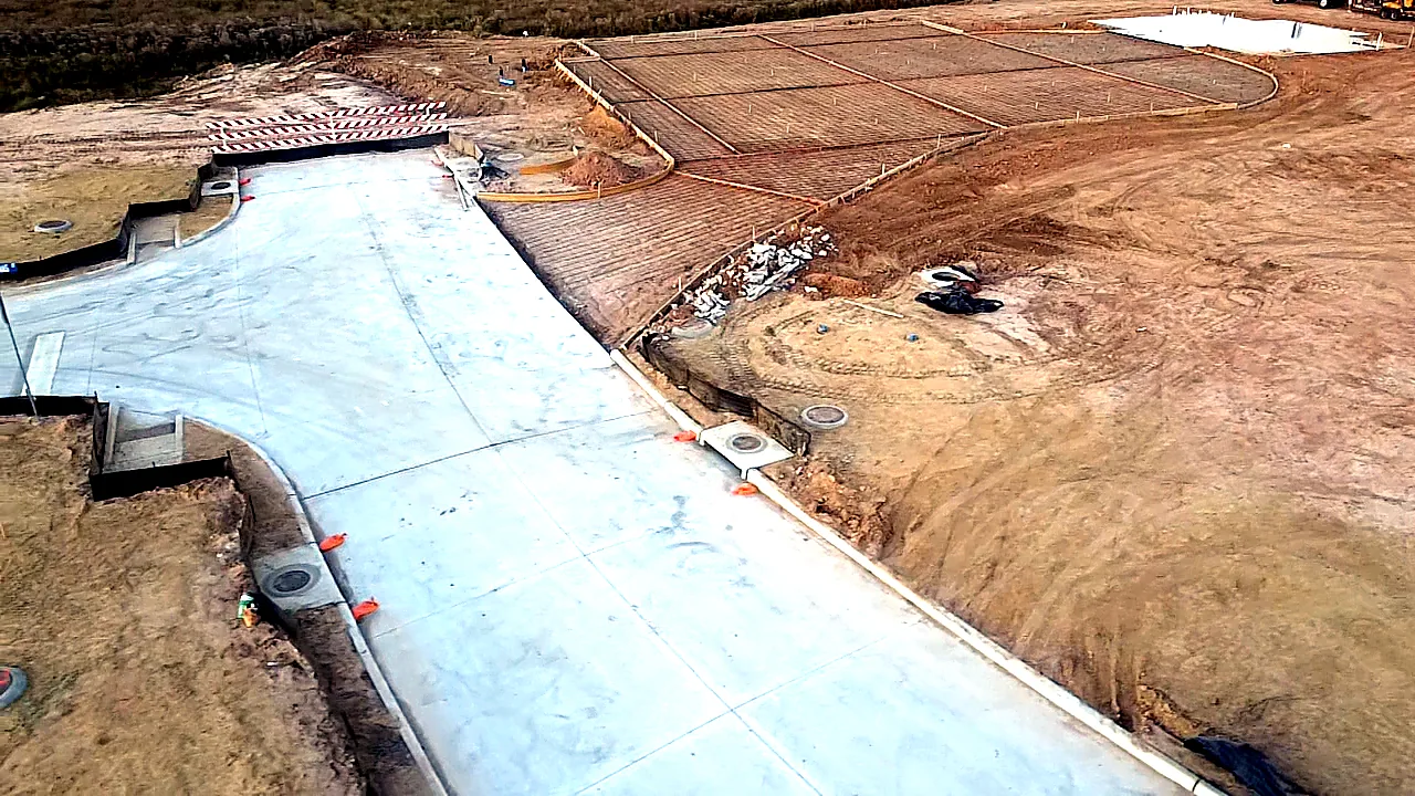 Aerial view of commercial concrete paving and drive lane by JP Concrete Solutions in Katy, TX