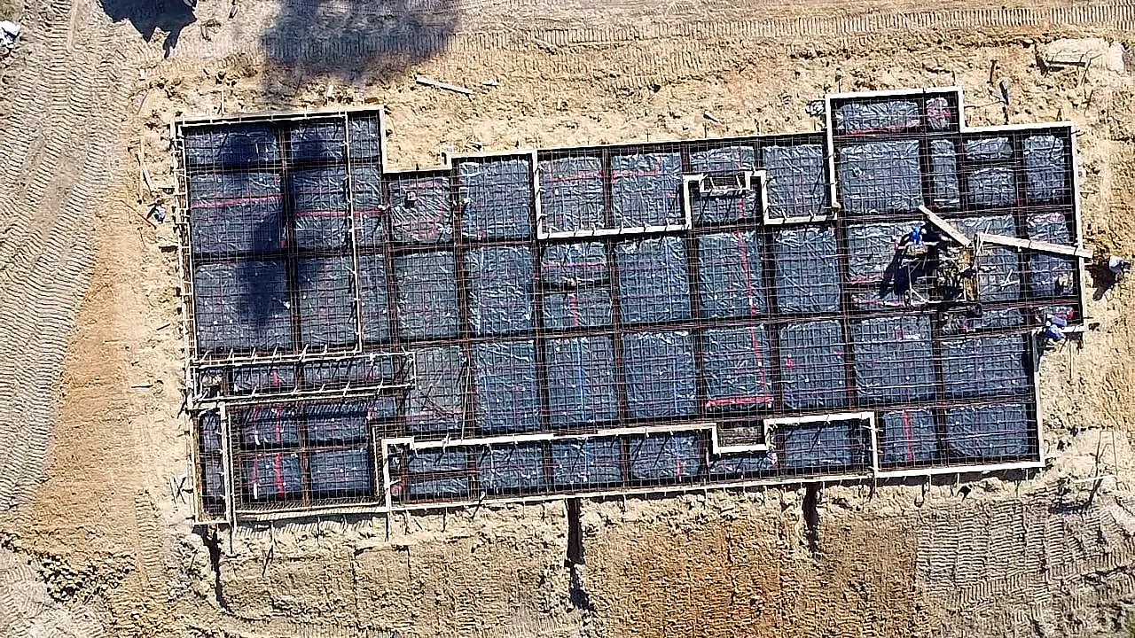 Aerial view of a 5,000 sq ft post-tension foundation rebar grid by JP Concrete Solutions in Livingston, TX