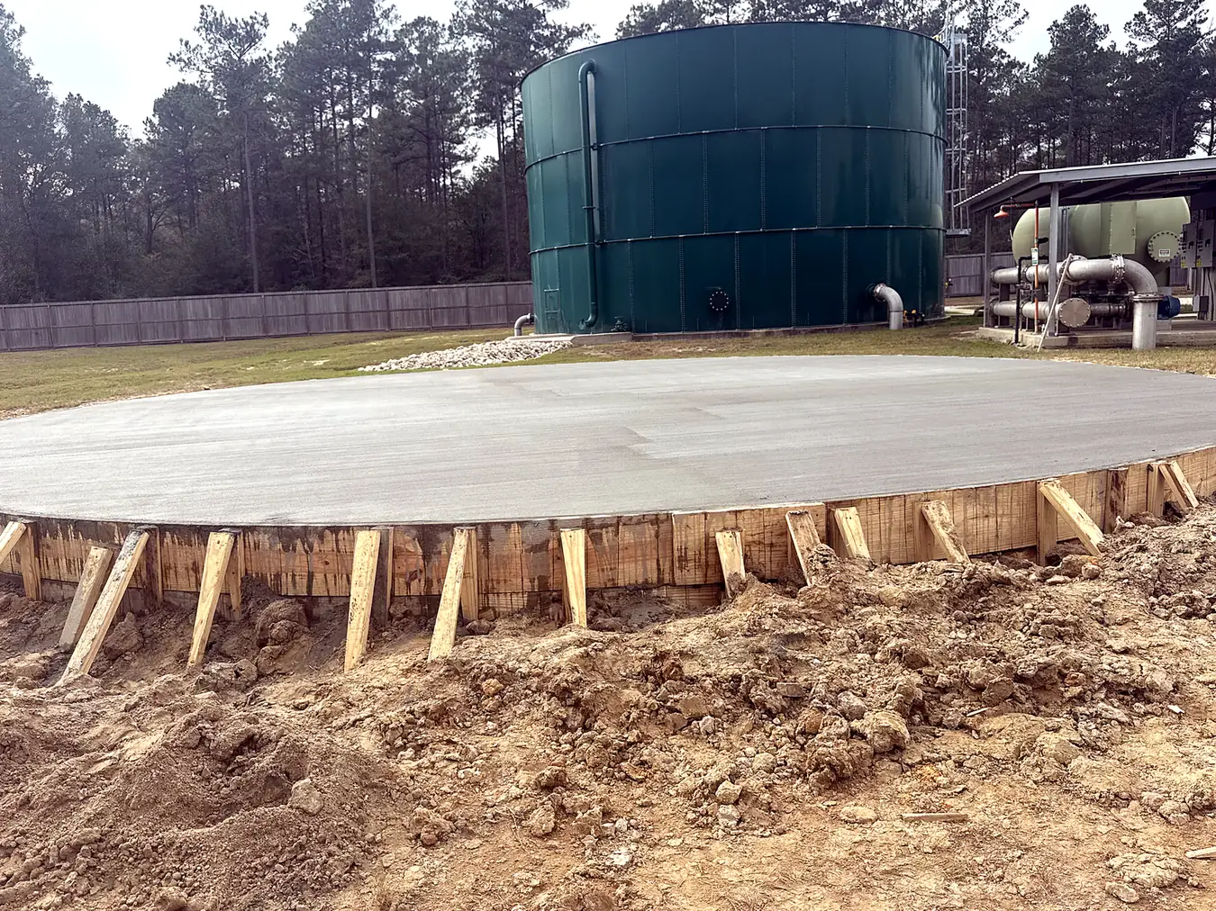 Finished industrial ground-storage tank foundation at a water plant in Splendora, TX